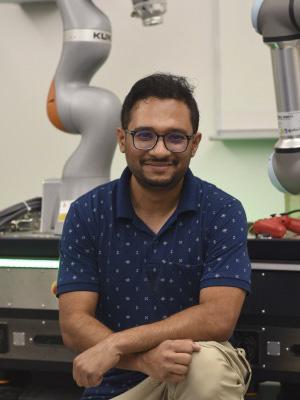 Headshot of Azmyin Kamal